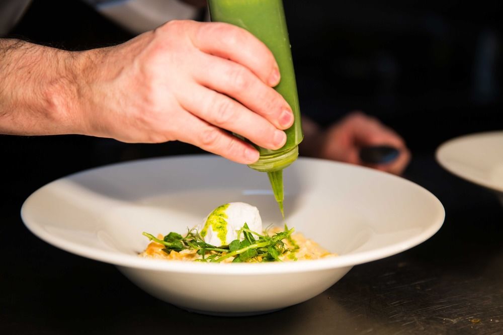 The Millstone, Mellor Hotell Blackburn  Exteriör bild A chef using a piping bag